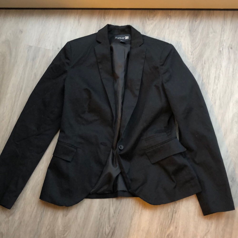 Black blazer with shoulder pads